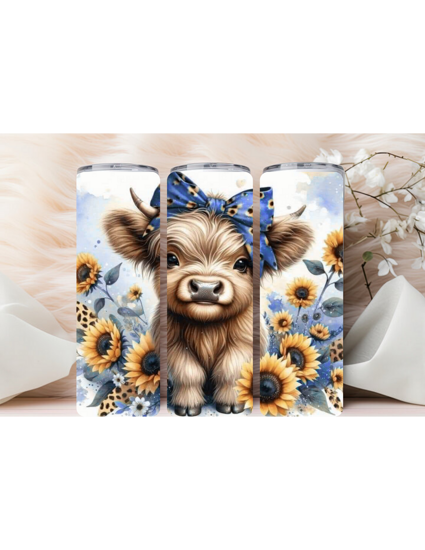 Baby highland cow with sunflowers