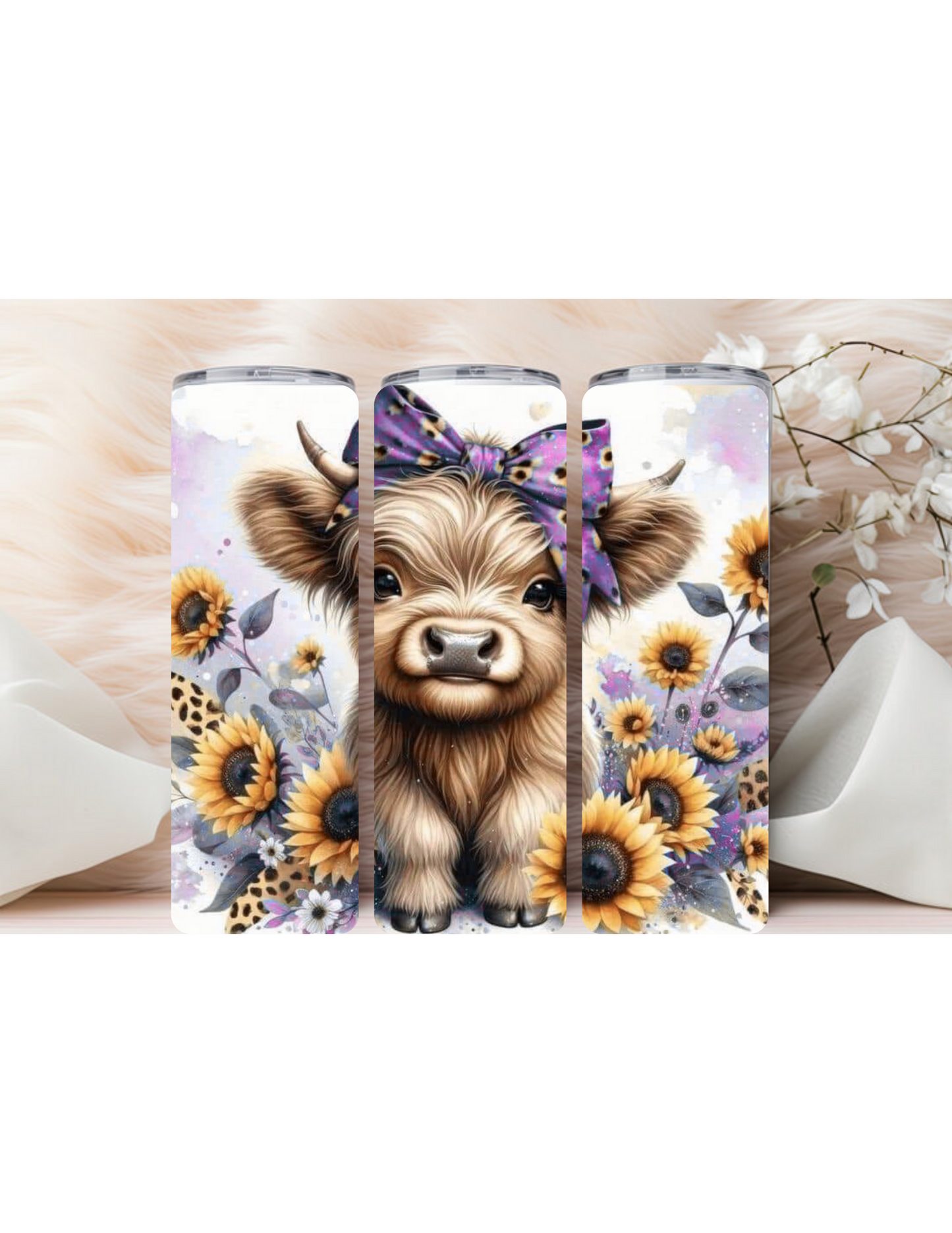 Baby highland cow with sunflowers